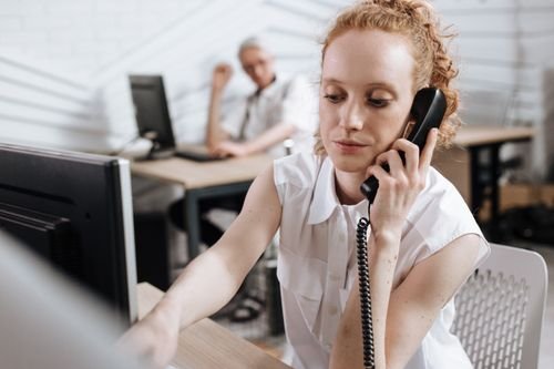 Sales agent on a phone call in the office